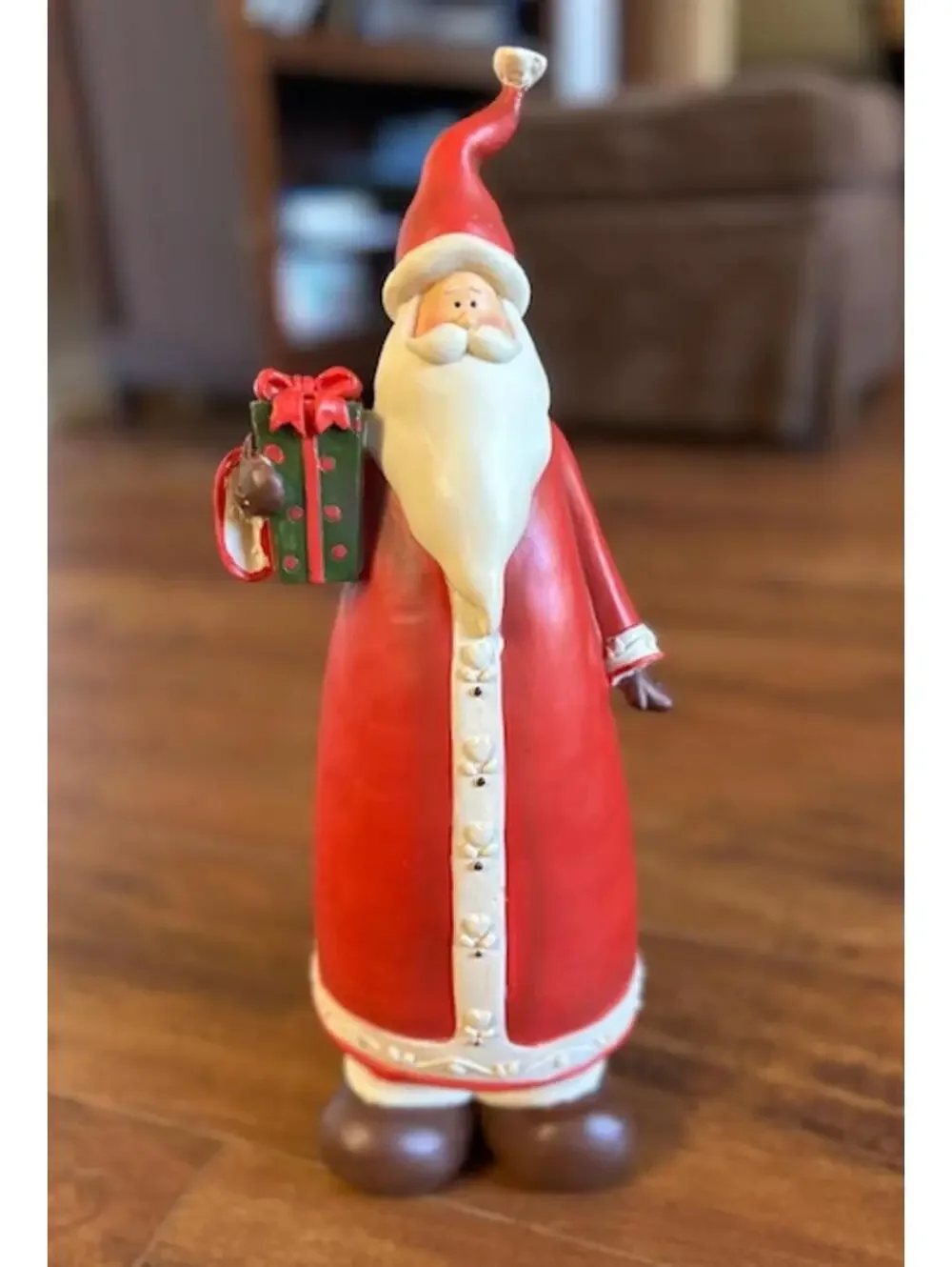 Vintage Ceramic Santa Claus Figurine with Gift